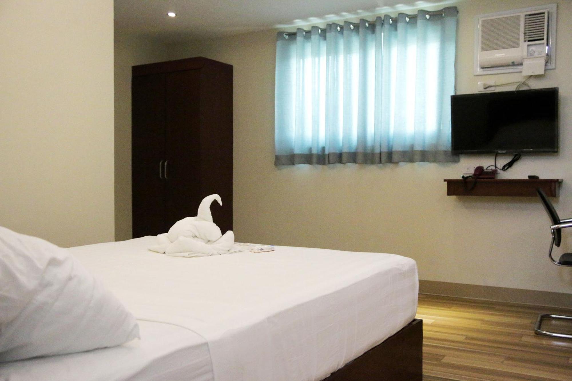 Happytelle Hotell Dipolog Eksteriør bilde